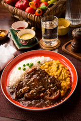 Fried cow liver with locro pumpkin stew Buffet table Peruvian comfort restaurant gourmet food
