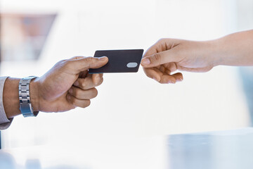 Corporate hands exchange credit card to accountant for payment for company tax bills, money loan and accounting fees. Businessman with banking card to invest in financial savings budget investment