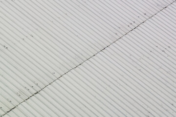 Close up of a grey metal sheet part of a roof 