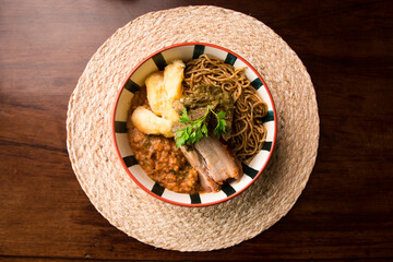 Sopa seca spaghetti carapulcra and yuca Peruvian comfort restaurant gourmet food