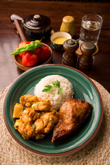 Roasted chicken with potato stew Peruvian comfort restaurant gourmet food