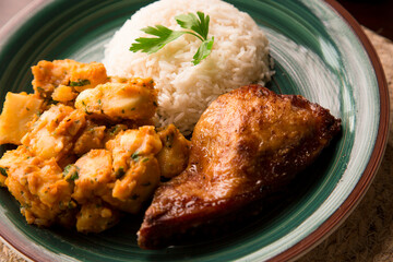 Roasted chicken with potato stew Peruvian comfort restaurant gourmet food