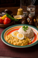 Aji de gallina chicken cream boiled eggs Peruvian comfort restaurant gourmet food