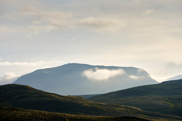 Hills and mountains in cloudy morning