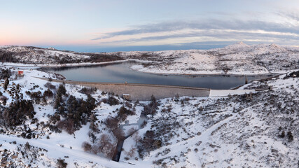 Snow in the Mountains with a Lagoon