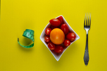 fresh and tasty vegetables on a white dish