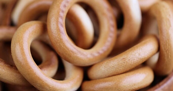 traditional crunchy and dry bread product, traditional Slavic food, wheat flour bagels fall on the table
