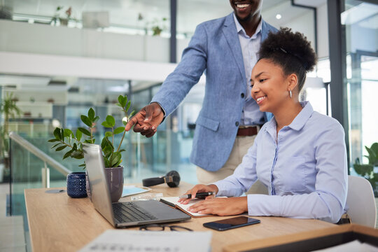 Learning, laptop training and coaching business intern while manager, boss and ceo helps woman in office. Planning ideas, kpi strategy and market innovation vision on technology with marketing leader