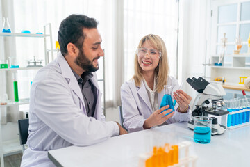 The scientist doctor created a vaccine against the coronavirus.Coronavirus 2019-nCoV Blood Sample. virus outbreaking.Technician holding blood tube test in the research laboratory