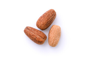 Dry nutmeg isolated on white background , top view , flat lay.