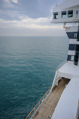View from open outdoor deck of legendary luxury ocean liner cruise ship on passage during...