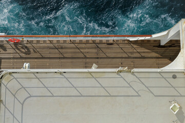 View from open outdoor deck of legendary luxury ocean liner cruise ship on passage during...