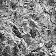 Stonework in the form of a background in black and white tones