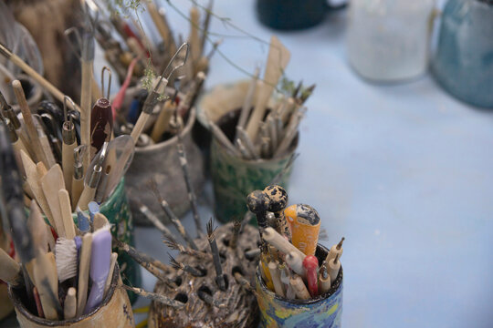 Tools for working with clay and making pottery and utensils. A diverse set of hand tools for pottery in various stands for drawing and carving designs and patterns on clay.