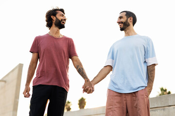Fototapeta premium Gay couple embracing and showing their love. LGBT community..