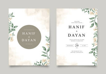 Elegant wedding invitation with yellow flowers and leaves
