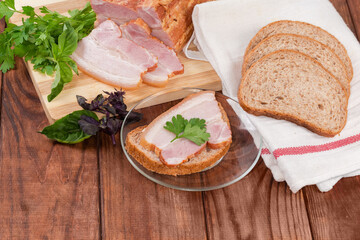 Open sandwich with boiled smoked pork belly and ingredients