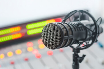 Professional microphone and sound mixer in radio station studio
