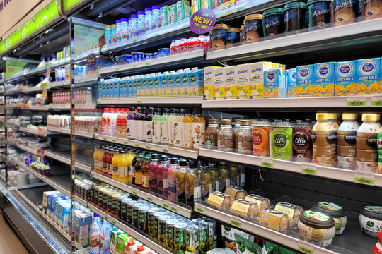 PENANG, MALAYSIA - 17 AUG 2022: Huge fridge with various choice foods and beverages in CU Convenience Store. CU is a South Korean convenience store chain that is operated and owned by BGF Retail.
