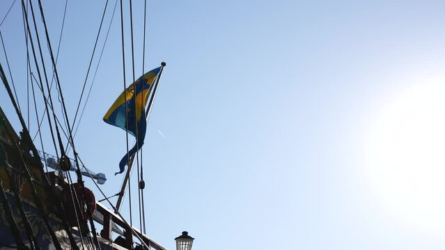 London Canary Wharf Aug 2022 The G&ouml;theborg of Sweden's flag ripples in the wind