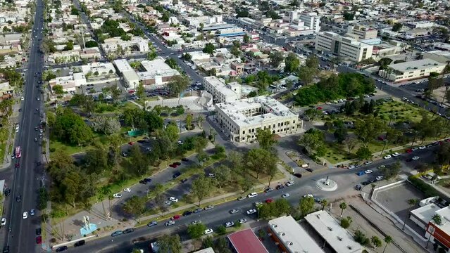Drone flying over a city around a mexican university