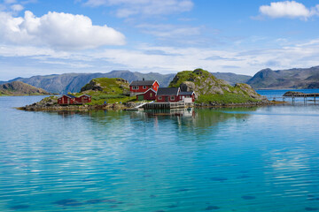 Fishing village with traditional red rorbu in Trollholmen island, Mageroya, Norway