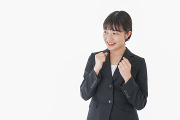 ガッツポーズをするビジネスウーマン