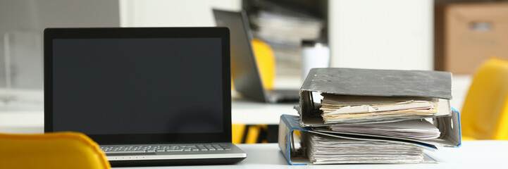 Empty workplace folders with documents in office on table closeup