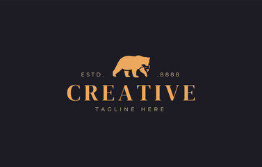 Bear Logo Design. Bear Catches a Salmon Silhouette Vector Animal