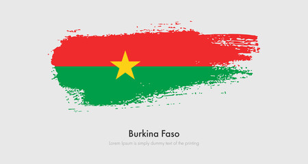 Brush painted grunge flag of Burkina Faso. Abstract dry brush flag on isolated background
