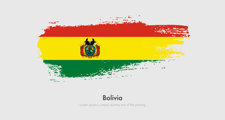 Brush painted grunge flag of Bolivia. Abstract dry brush flag on isolated background