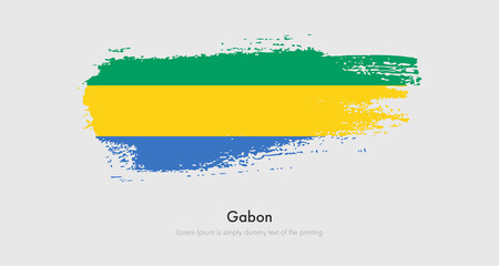 Fototapeta premium Brush painted grunge flag of Gabon. Abstract dry brush flag on isolated background