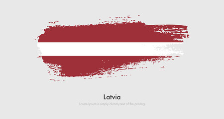 Brush painted grunge flag of Latvia. Abstract dry brush flag on isolated background