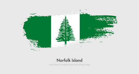 Brush painted grunge flag of Norfolk Island. Abstract dry brush flag on isolated background
