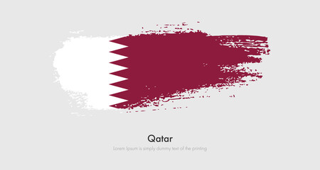 Brush painted grunge flag of Qatar. Abstract dry brush flag on isolated background