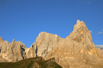 Breathtaking view of the Dolomites with the peak called Cimon della pala and the orange color at sunset
