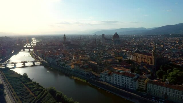 Early Morning Scenery Over Florence Cityscape And Arno River In Tuscany, Italy. aerial drone