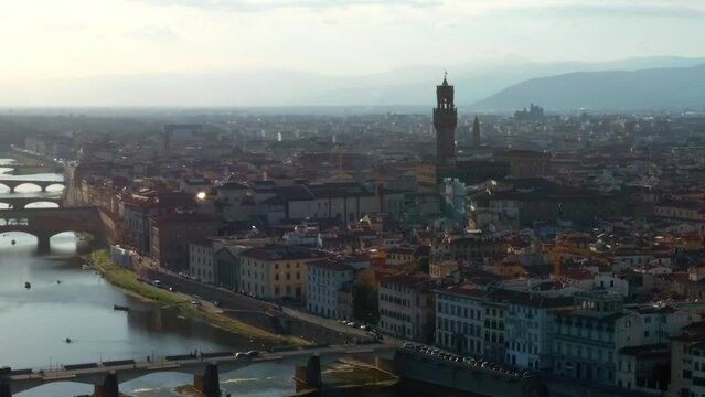 The Aerial View Of Old City Of Florence With Arno River In Tuscany, Italy.