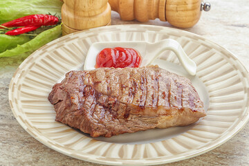 Grilled rib-eye steak beef meat
