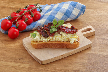 Bruschetta with soft cheese and tomato