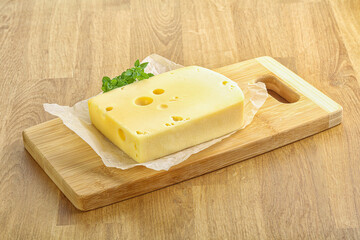 Maasdam cheese over the board