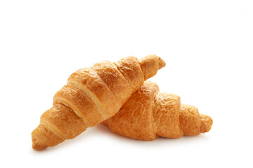 Fresh tasty croissants isolated on white background. French pastry