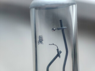 Burn out car bulb from close up. defect H7 bulb for vehicle