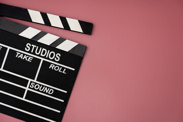 movie clapper on table background ; film, cinema and video photography concept