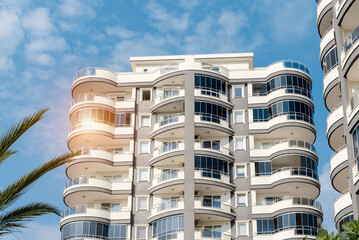 Low angle view of an apartment building with balconies.