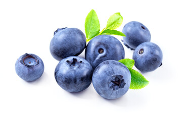 Blueberry isolated on white background. Closeup group of fresh ripe blueberries with leaves.