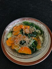 Vegetable soup on a dark background
