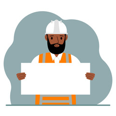 Engineer man holding a blank sheet of paper. The concept of a builder, engineer, planner or designer.