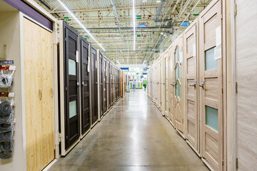 entrance and interior doors in the warehouse of the hardware store. 