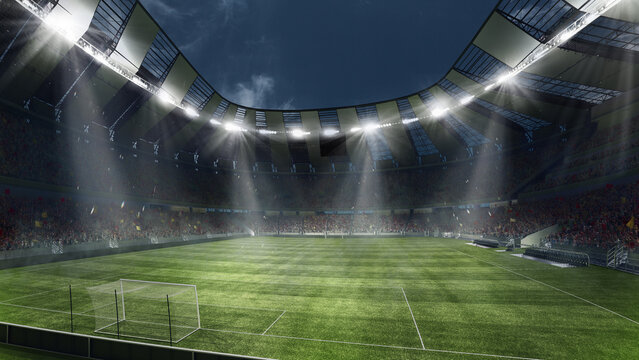 Empty Football Field With Flashlights And Dark Night Sky Background. Stadium With Filled Stands With Sports Soccer Fans.